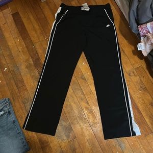Nike blank & white sportswear flared pants sz small